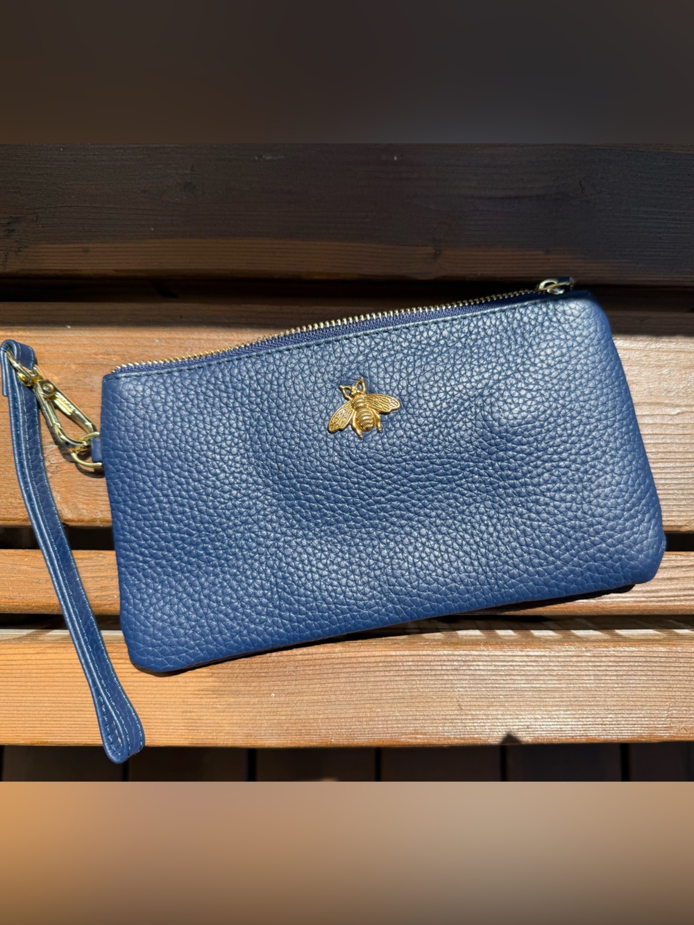 Unk Navy Blue Pebbled Leather Wristlet Clutch with Gold Bee Accent